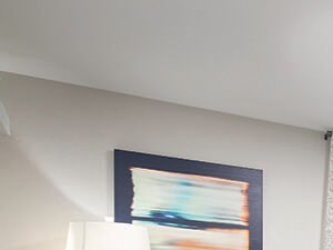 EspressoHomeFinishes-livingroom Living room at Merrick Apartments in Placentia CA